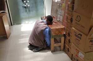 man sitting on floor